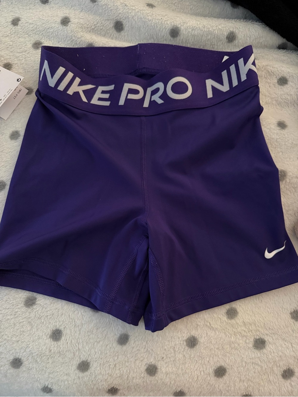 Nike Pro Women's Purple Performance Shorts with White Swoosh